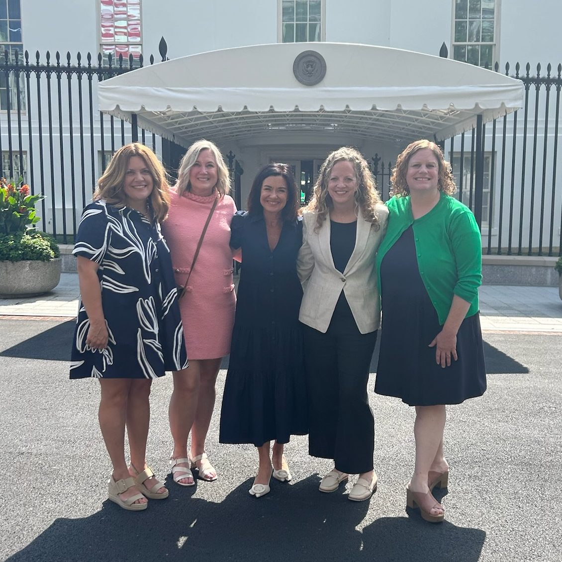The Founders of Healthy Birth Day, Inc. stand in front of the White House.