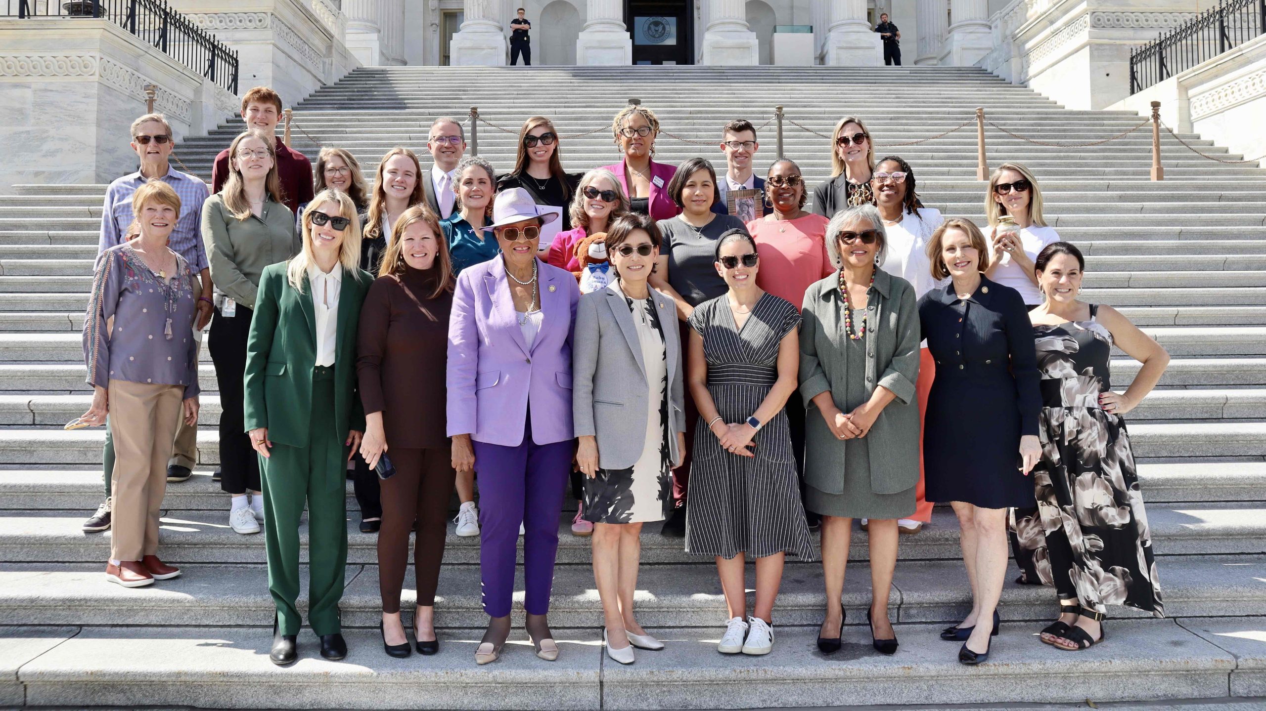 Stillbirth prevention advocates from across the U.S. stand with Rep. Alma Adams on the steps of the U.S. Capitol on Sept. 19, 2025.