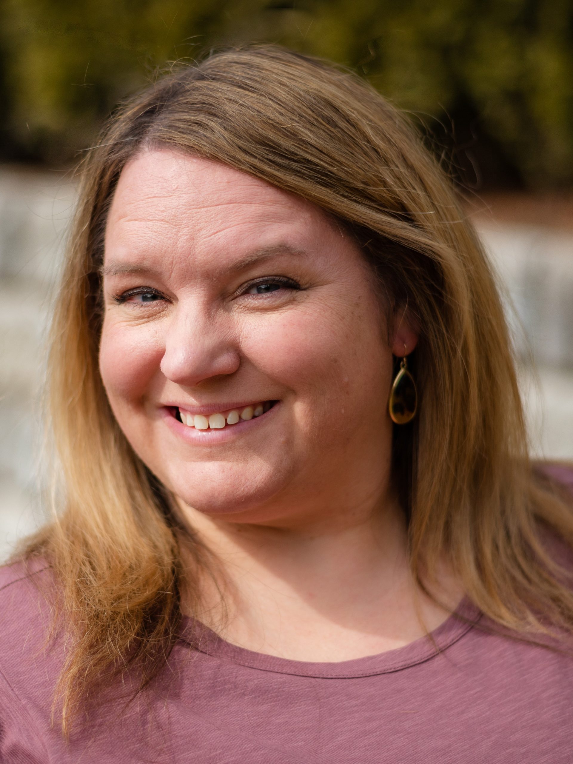 Sarah Coleman, Director of Key Relationships for Healthy Birth Day, Inc., wearing a mauve shirt.